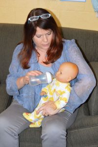 Barbara Robertson demonstrating paced bottle feeding